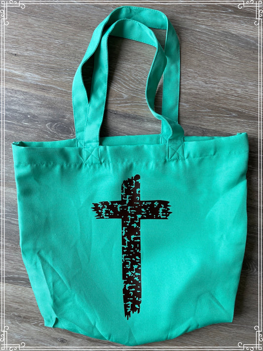 Shoulder bag with distressed cross